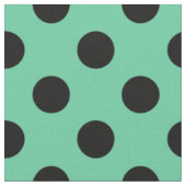 Schwarze Polka Punkte auf Minzgrün Stoff (Nahaufnahme)
