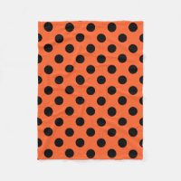 Schwarze Polka-Punkte auf Orange