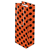 Schwarze Polka-Punkte auf Orange