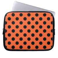 Schwarze Polka-Punkte auf Orange