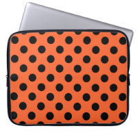Schwarze Polka-Punkte auf Orange