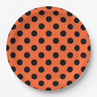 Schwarze Polka-Punkte auf Orange