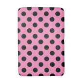 Schwarze Polka-Punkte auf Rosa Badematte (Vorderseite Vertikal)