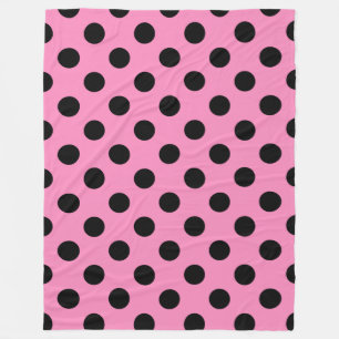 Schwarze Polka-Punkte auf Rosa Fleecedecke