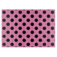 Schwarze Polka-Punkte auf Rosa