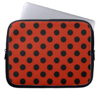 Schwarze Polka Punkte auf rot