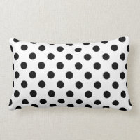 Schwarze Polka Punkte auf weißem Hintergrund