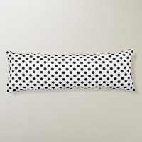 Schwarze Polka Punkte auf weißem Hintergrund