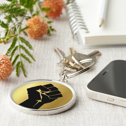 Schwarze Power-Faust Schlüsselanhänger (Seite)