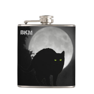 Schwarze Schälkatze beim Monsun Flachmann
