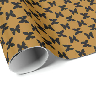 Schwarze Schmetterlinge auf mattgoldenem Hintergru Geschenkpapier