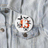 Schwarze Schmetterlinge auf Orange "13" Knopf Button (Beispiel)