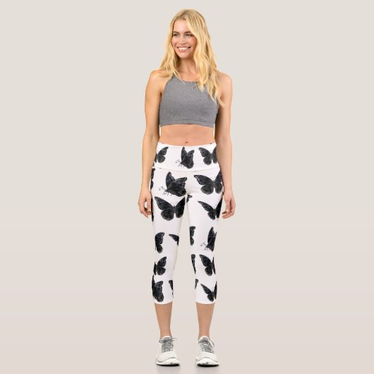 Schwarze Schmetterlinge Capri Leggings (Vorderseite)
