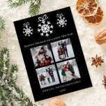 Schwarze Schneeflocken Ornamente FotoCollage Feiertagskarte<br><div class="desc">Feiern Sie die Saison mit dieser Black Snowflake Ornaments Foto Collage Holiday Card, erstellt, um Ihre festliche Freude zu teilen. Dieses Foto-Gruß zeichnet sich durch eine elegante Anordnung mit zarten, weißen Schneeflocken in einem charmanten Schneeflocken-Design aus und zeigt eine wunderschöne Collage aus vier Fotos Ihrer Fotos. Moderne Typografie verleiht dem...</div>