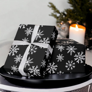 Schwarze Schneeflocken zur Illustration Weihnachts Geschenkpapier