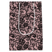 Schwarze Schnürsenkel auf rosafarbenem Mittelteil Mittlere Geschenktüte (Rückseite)