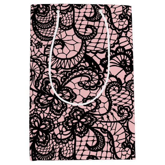 Schwarze Schnürsenkel auf rosafarbenem Mittelteil Mittlere Geschenktüte (Vorderseite)