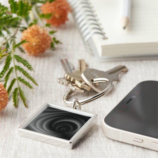 Schwarze Schwerkraft Schlüsselanhänger (Seite)