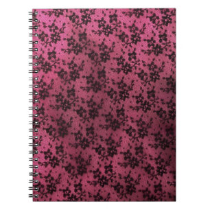 Schwarze Seite mit rosa Hintergrund Notizblock