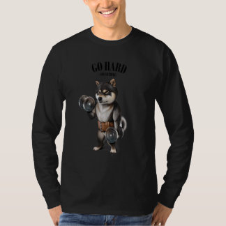 Schwarze Shiba Hunde Muskeltraining mit Dumbell in T-Shirt