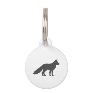 Schwarze Silhouette eines flauschigen Fuchs Haustiermarke