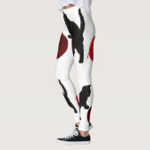 Schwarze Silhouette Kitty mit rotem Wollball Leggings (Links)