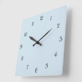 Schwarze Skriptnummern auf blassblauem Wccn Quadratische Wanduhr (Winkel)