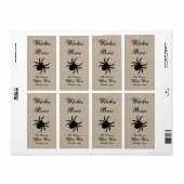 Schwarze Spinne auf Jute-Weinetikett (Vorne)