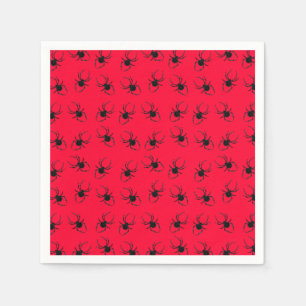 Schwarze Spinnen auf Rot Serviette
