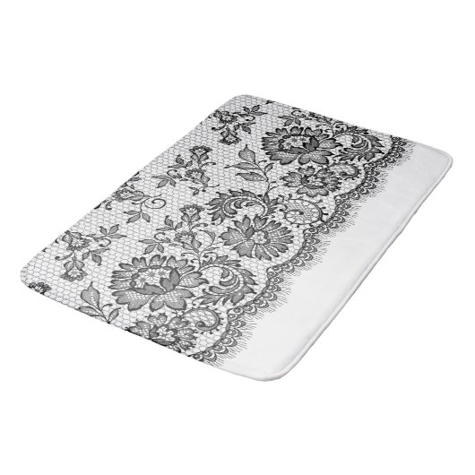 Schwarze Spitze auf Weiß Badematte (Schrägansicht)