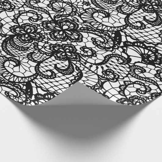 Schwarze Spitze auf Weiß Geschenkpapier (Ecke)