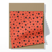 Schwarze Sterne auf orangefarbenem Halloween-Party Stoff