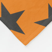 Schwarze Sterne auf Pumpkin Fleecedecke (Ecke)