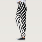 Schwarze Streifen Leggings (Links)