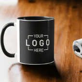 Schwarze Tasse des benutzerdefinierten Logos