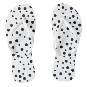 Schwarze Tupfen auf weißen Flipflops Badesandalen