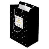 Schwarze Tupfen, die aus Stadtgast-Willkommen Mittlere Geschenktüte (Rückseite Schrägansicht)