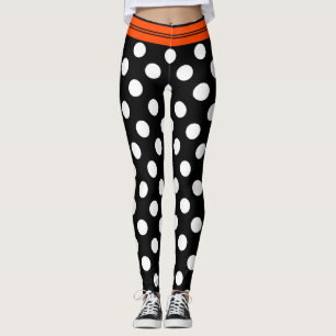 Schwarze u. weiße Retro Tupfen mit orange Streife Leggings