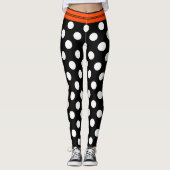 Schwarze u. weiße Retro Tupfen mit orange Streifen Leggings (Vorderseite)