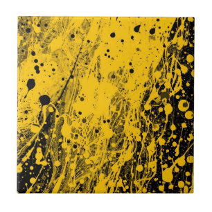 Schwarze und gelbe Farbspritzer Fliese