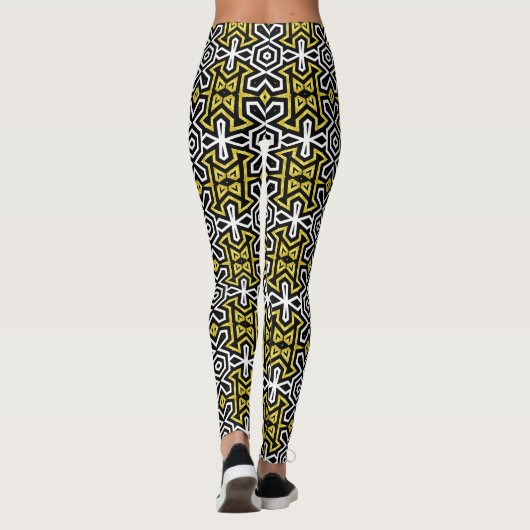 Schwarze und goldene Leggings, die mit Funky Azthe Leggings (Rückseite)