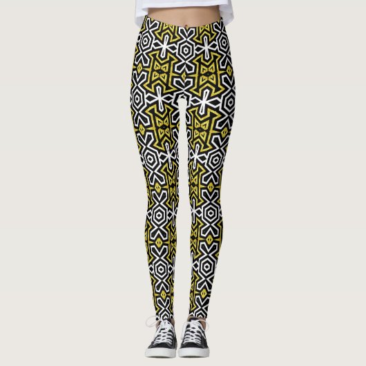 Schwarze und goldene Leggings, die mit Funky Azthe Leggings (Vorderseite)