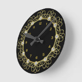 Schwarze und goldene runde Uhr (Winkel)
