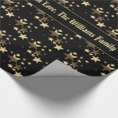 Schwarze und goldene Weihnachtssterne Muster hinzu Geschenkpapier (Ecke)