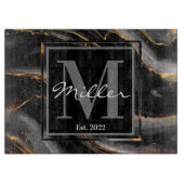 Schwarze und goldmarmorierte, frisch gezogene Häus Schneidebrett (Vorderseite)