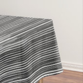 Schwarze und graue Farben-Tropfen auf Weiß Tischdecke (Beispiel)