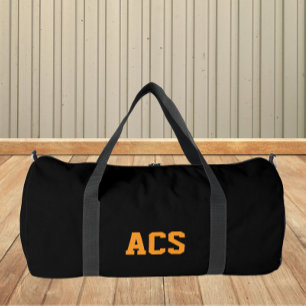 Schwarze und orangefarbene Schulfarben und -buchst Duffle Bag