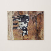 Schwarze und weiße Bergziege auf Felsen Puzzle (Horizontal)