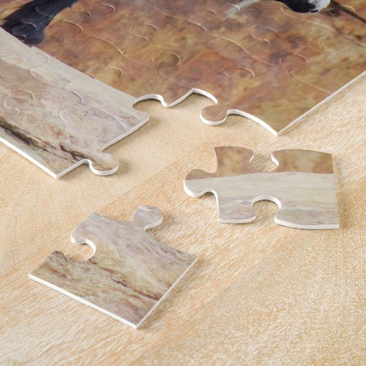 Schwarze und weiße Bergziege auf Felsen Puzzle (Seite)