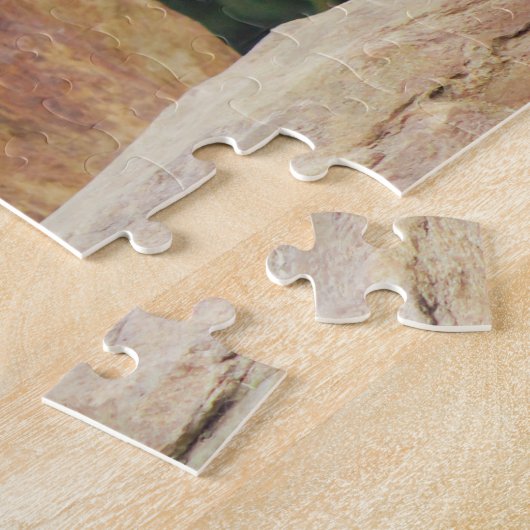 Schwarze und weiße Bergziege auf Felsen Puzzle (Seite)